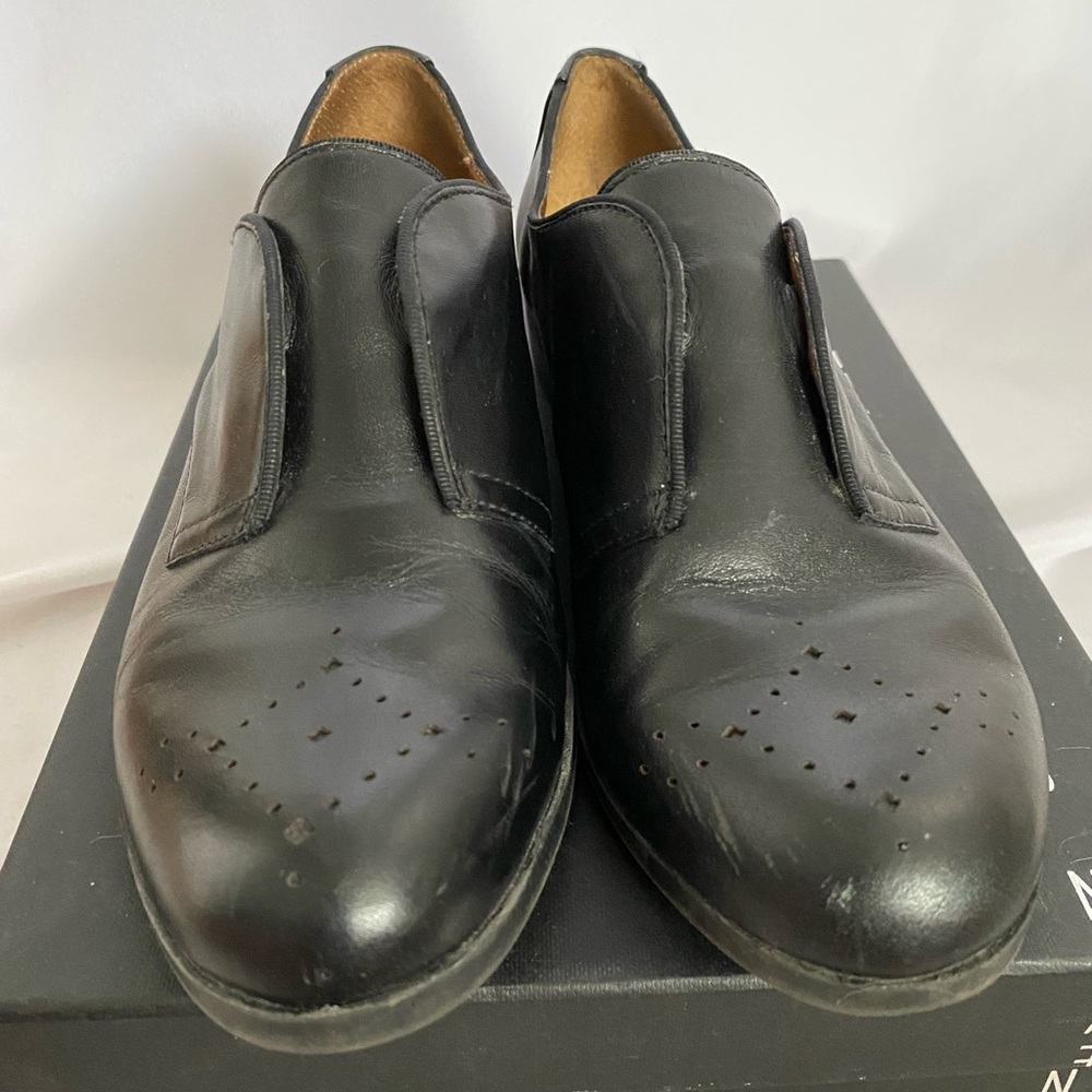 Black leather loafers